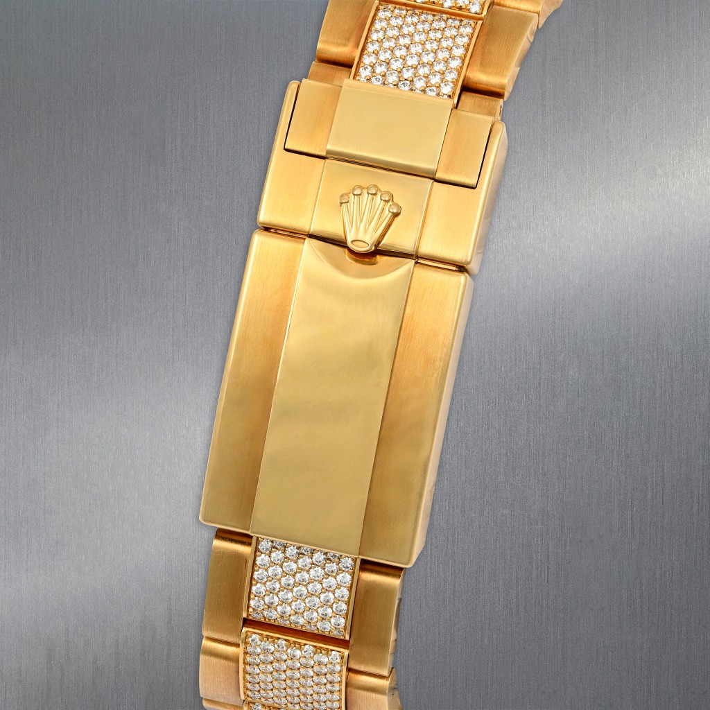 ROLEX GMT MASTER II YELLOW GOLD