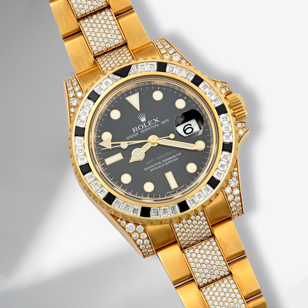 ROLEX GMT MASTER II YELLOW GOLD